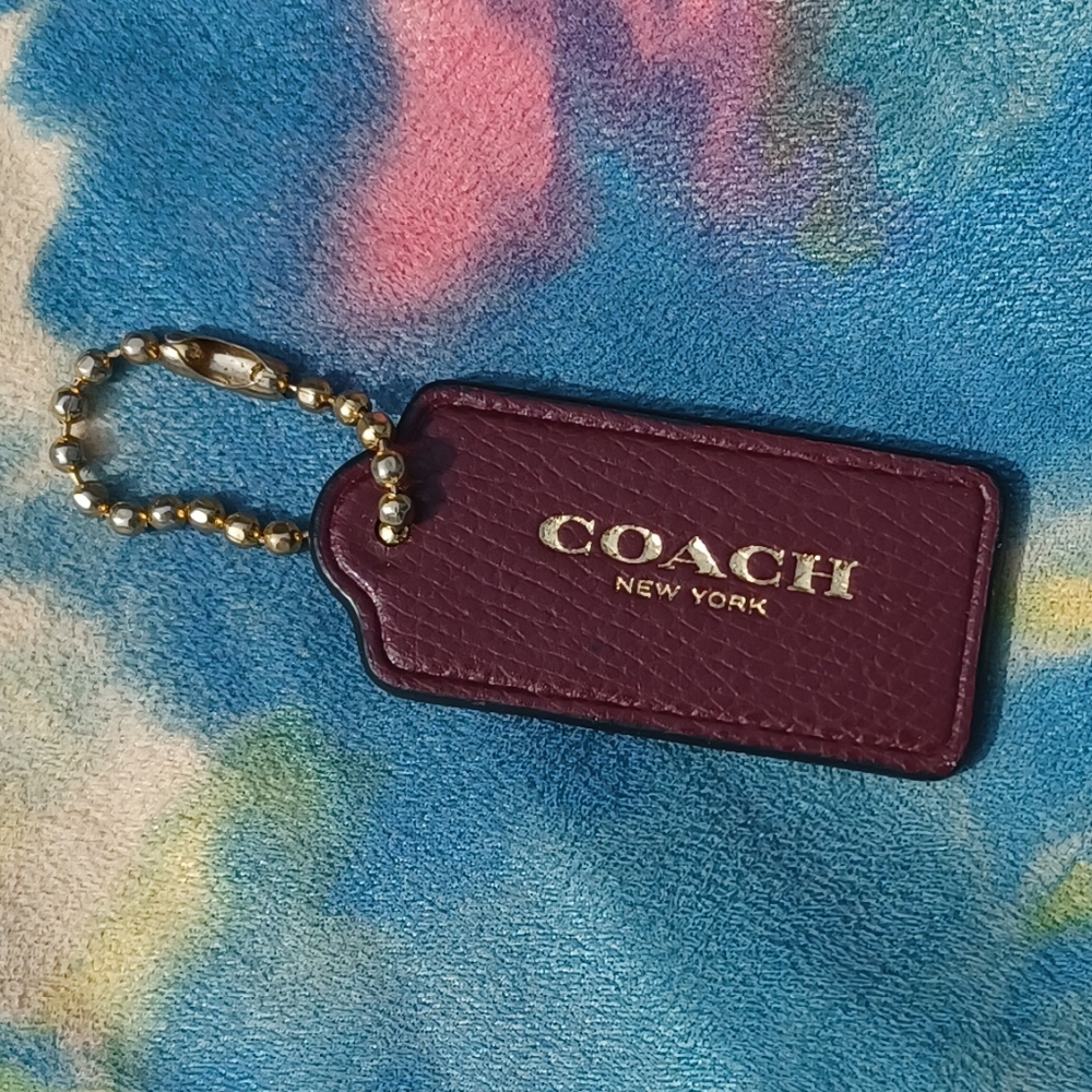 Coach bag tag